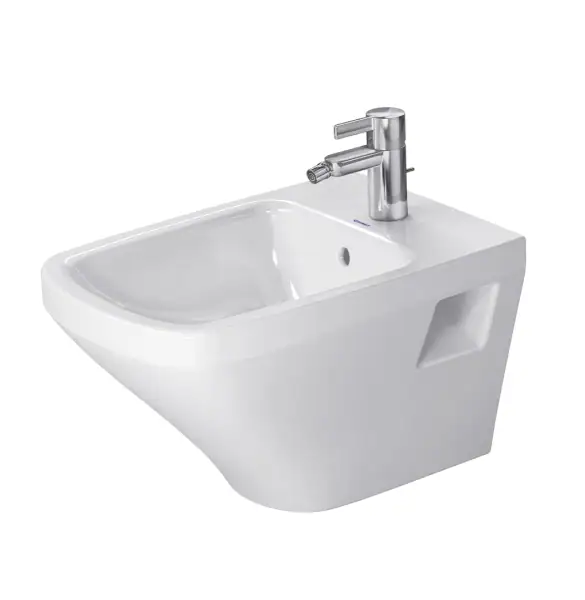 2. Freestanding white bathroom sink with modern chrome tap for stylish bathroom designs.