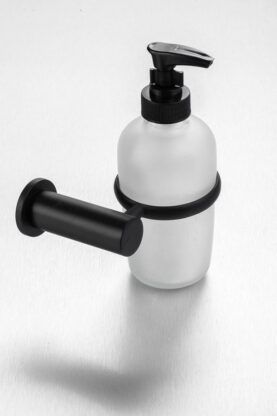 Scent dispenser with wall-mounted holder for bathroom or kitchen use.