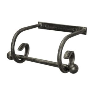 Vintage wrought iron towel rail for bathroom decor and functionality.