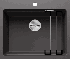 Stainless steel kitchen sink with drainer and tap holes for modern kitchen setup.