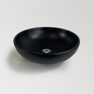 Sleek black ceramic bathroom basin perfect for modern bathroom designs.