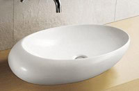 Elegant white oval freestanding bathroom sink, perfect for modern bathroom renovations in South Africa. Durable and stylish ceramic basin for sophisticated bathroom designs.