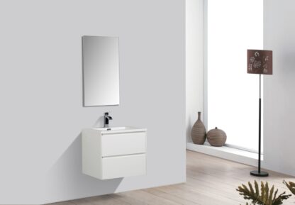 Sleek white bathroom vanity with mirror and modern tap unit in minimalist bathroom interior.