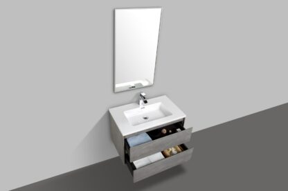 Modern bathroom vanity with a white sink, grey cabinet drawers, a large wall mirror, and a chrome faucet, perfect for contemporary bathroom designs.