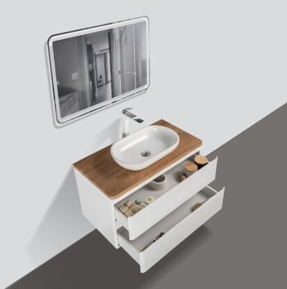 Elegant bathroom vanity with a wooden countertop, white drawers, and oval vessel sink, enhancing modern bathroom decor. Ideal for stylish and functional bathroom renovations.