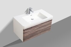 Modern wall-mounted bathroom vanity with a sleek white bowl and wood finish cabinet, ideal for contemporary bathroom designs and efficient space utilisation in South African homes.