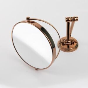 Rose gold magnifying makeup mirror with stand, perfect for bathroom or vanity, stylish and functional.