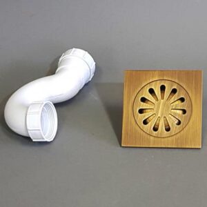 White plastic bathroom drain pipe with connecting joint, designed for effective plumbing drainage systems.