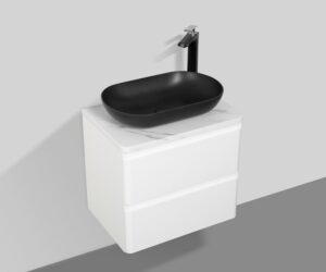 Solid black vessel sink with modern black faucet above white bathroom vanity cabinet. Perfect for contemporary bathroom decor and stylish washbasin setups.