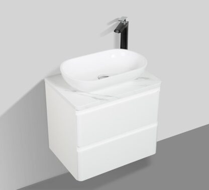 Modern white bathroom vanity with sink and black tap, suitable for contemporary bathroom decor. Perfect for small spaces and bathroom renovations. High-quality bathroom furniture from Bathroom Store.