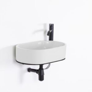 White compact bathroom sink with black faucet, ideal for modern bathrooms, available at Bathroom Store South Africa.
