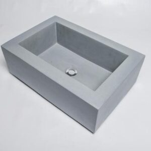 Minimalist concrete bathroom sink for modern interior design, durable and stylish.